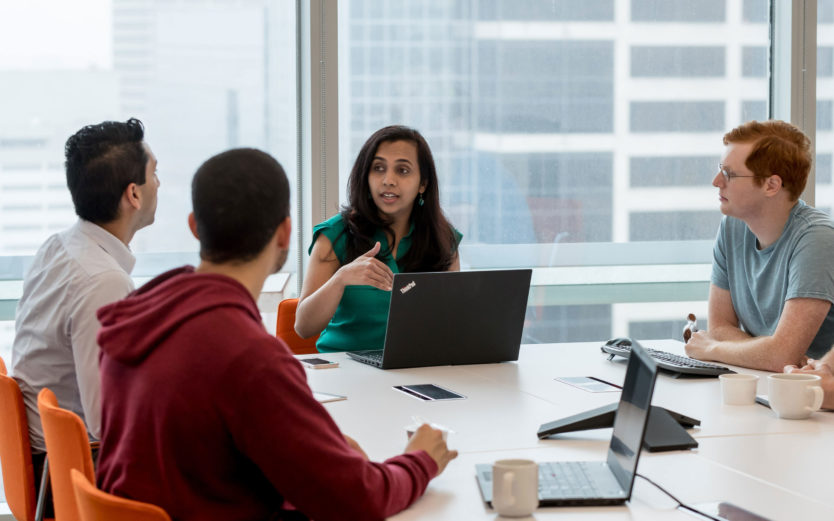 team meeting at the Two Sigma Houston Office