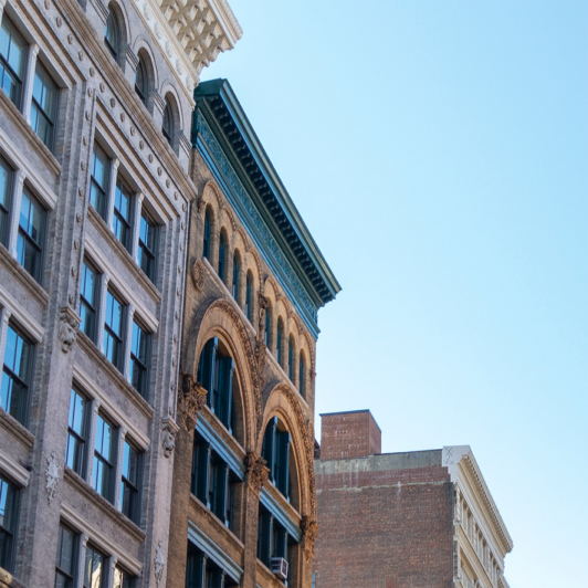 top half of three old buildings in SoHo