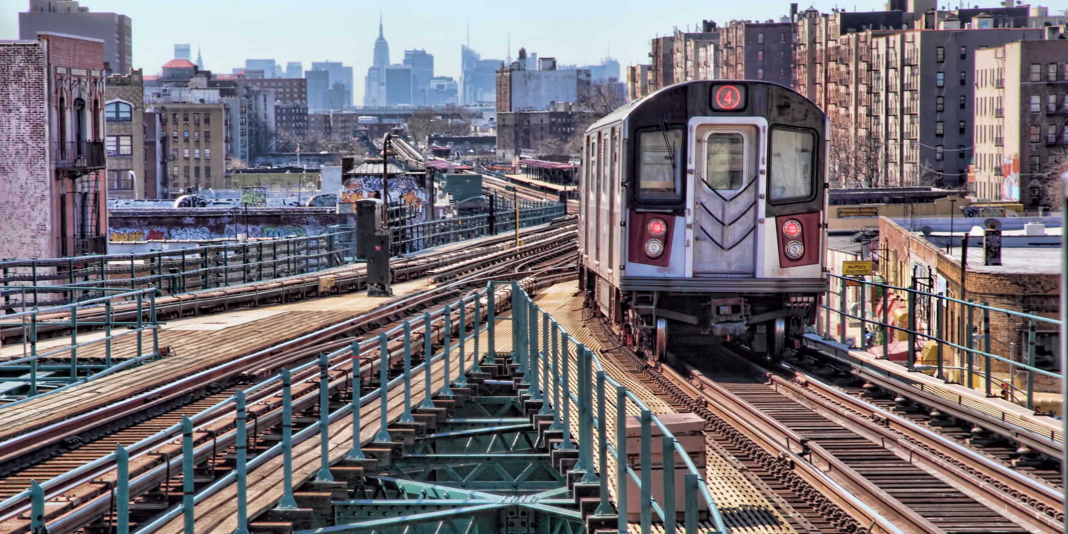 Above-ground subway track in a New York City borough.