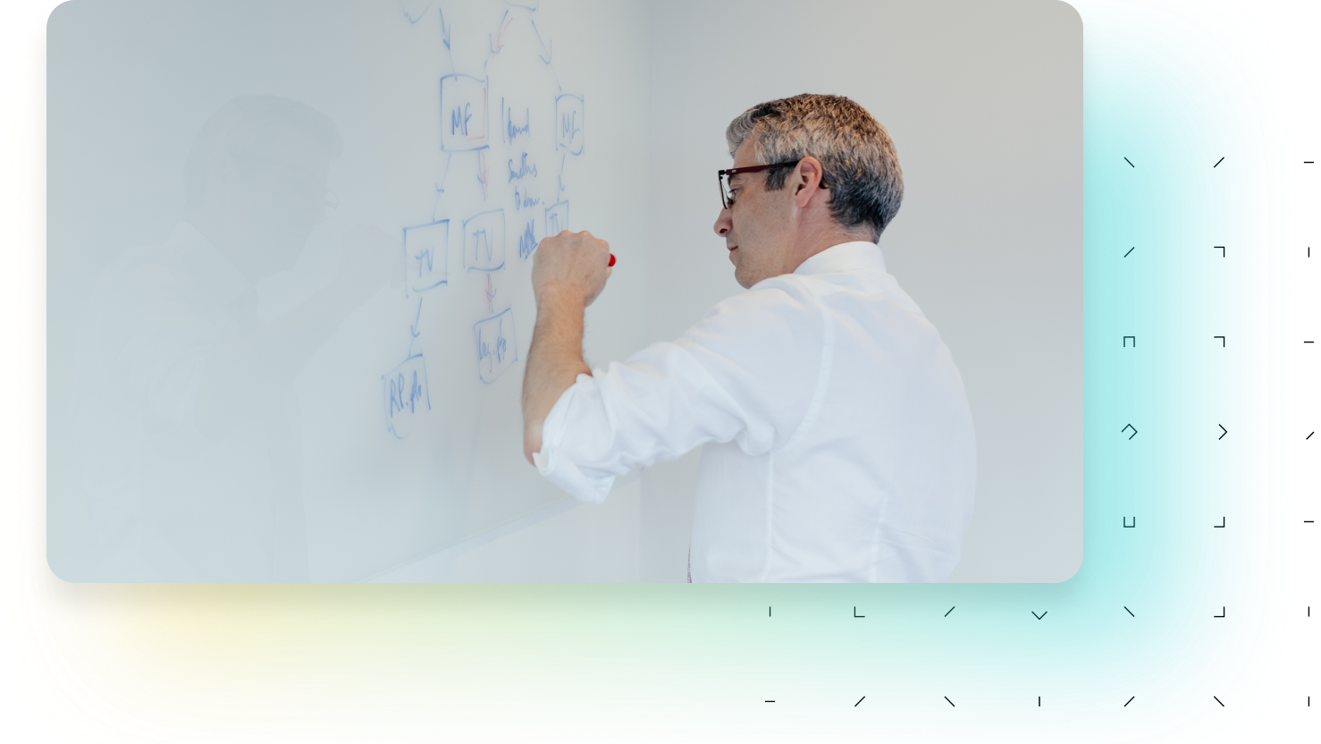 Man writing on a white board