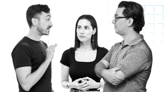 Three employees talking