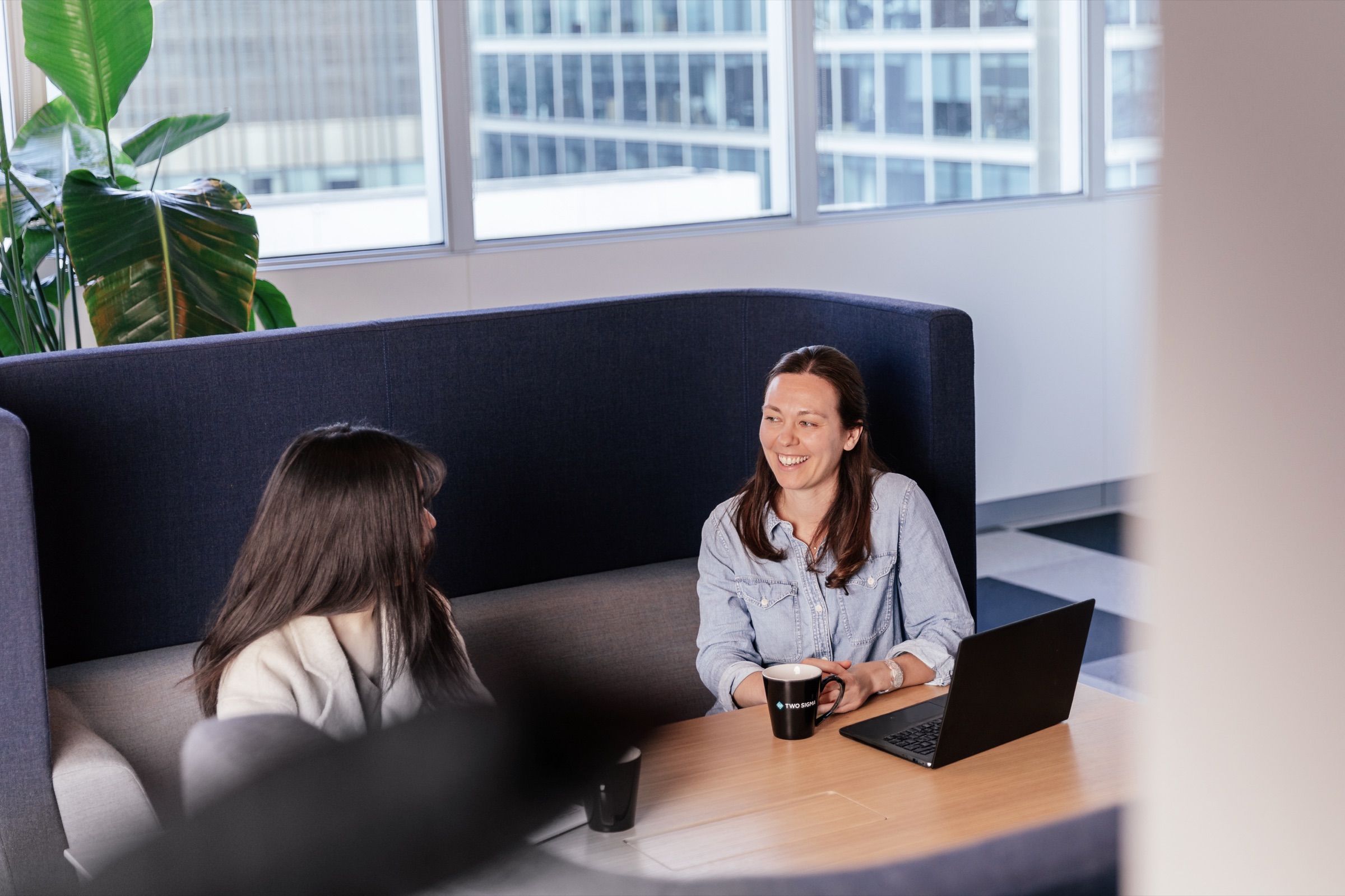 two employees talking