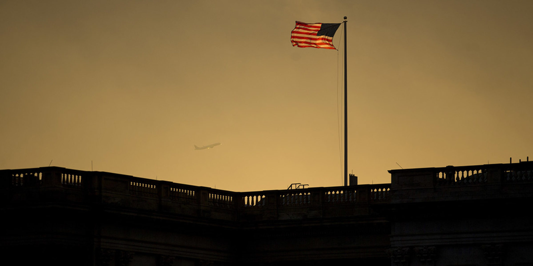 american flag in the sunset