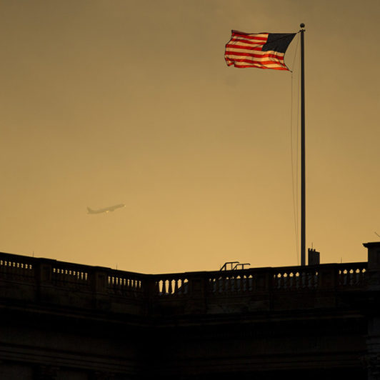 american flag in the sunset