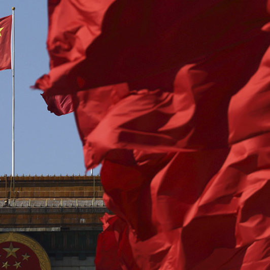 Picture of China Central Government Building with flags