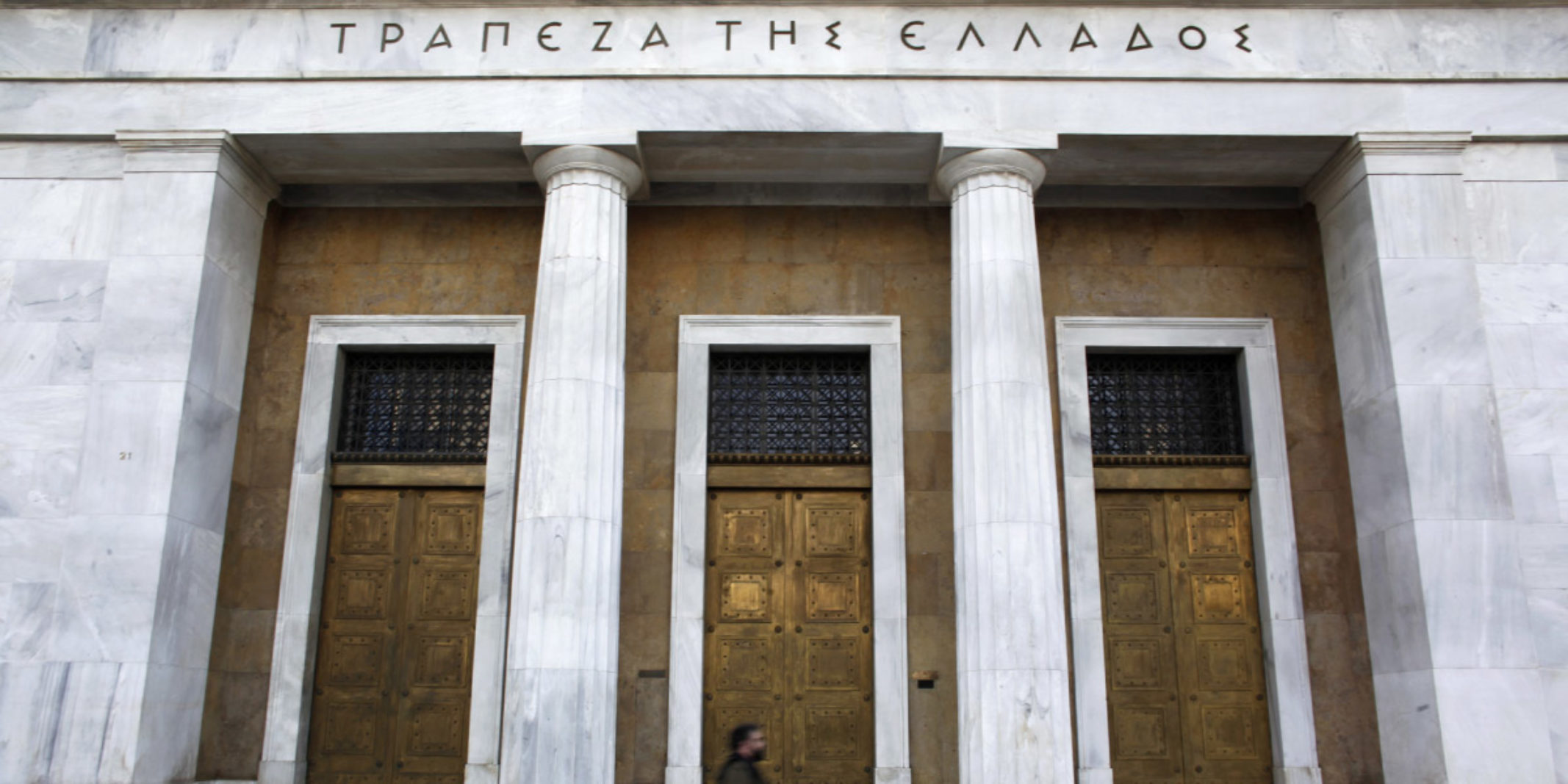 The closed entrance of a greek building